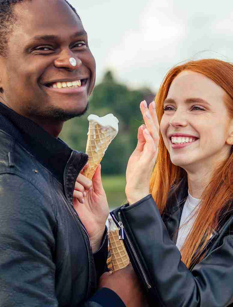Couple Feeding Each Other Ice Cream