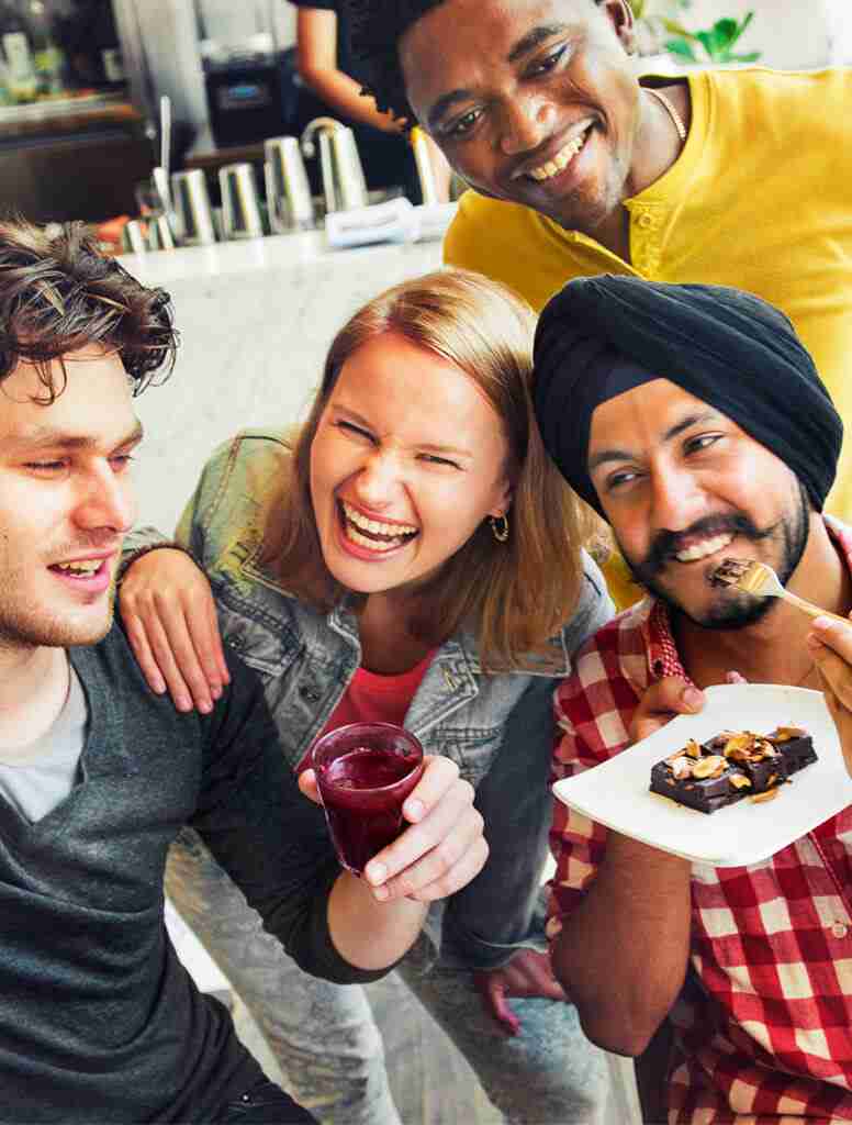 Friends Drinking and Eating Dessert